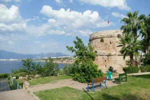 Ancient defensive tower on cliff photo