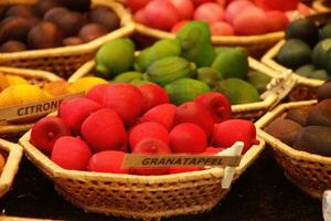 Scented carved wooden fruits at the Christmas market photo