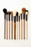 AI generated A set of makeup brushes and tools arranged artistically on a white background photo