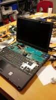 AI generated online tutorials or consulting forums dedicated to laptop repairs photo