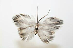 hecho a mano mariposa hecho de plumas foto