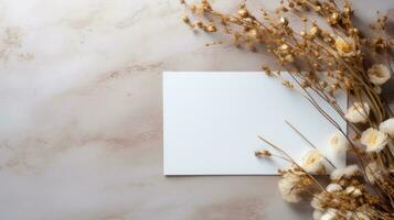 AI generated envelope, envelope white card and some dried flowers sitting on a concrete background photo