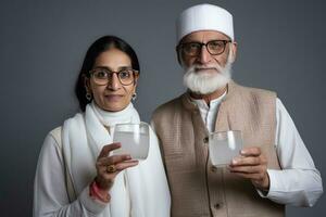 ai generado un más viejo hombre y mujer posando para un imagen mientras participación lentes de un alcohólico bebida. foto