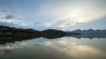 raft floating on water in dam againts sky video