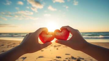 AI generated Hand holding a shape heart from the lover with sunlight background at the sea. Love on Valentine 's day or wedding. It expresses your love and care for your someone special to you. photo