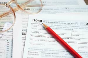 Tax form 1040 U.S. Individual Income Tax Return, business finance concept. photo