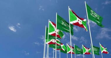 Burundi and KSA, Kingdom of Saudi Arabia Flags Waving Together in the Sky, Seamless Loop in Wind, Space on Left Side for Design or Information, 3D Rendering video