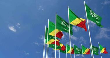Congo and KSA, Kingdom of Saudi Arabia Flags Waving Together in the Sky, Seamless Loop in Wind, Space on Left Side for Design or Information, 3D Rendering video