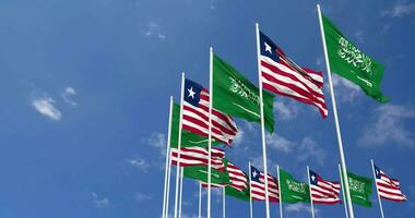 Libéria e ksa, reino do saudita arábia bandeiras acenando juntos dentro a céu, desatado ciclo dentro vento, espaço em esquerda lado para Projeto ou Informação, 3d Renderização video