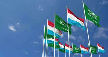 Luxembourg and KSA, Kingdom of Saudi Arabia Flags Waving Together in the Sky, Seamless Loop in Wind, Space on Left Side for Design or Information, 3D Rendering video