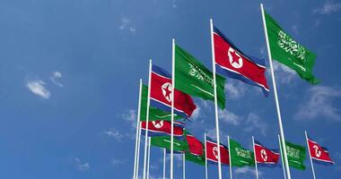 North Korea and KSA, Kingdom of Saudi Arabia Flags Waving Together in the Sky, Seamless Loop in Wind, Space on Left Side for Design or Information, 3D Rendering video