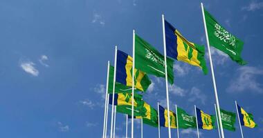 Saint Vincent and the Grenadines and KSA, Kingdom of Saudi Arabia Flags Waving Together in the Sky, Seamless Loop in Wind, Space on Left Side for Design or Information, 3D Rendering video