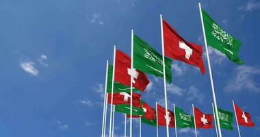 Switzerland and KSA, Kingdom of Saudi Arabia Flags Waving Together in the Sky, Seamless Loop in Wind, Space on Left Side for Design or Information, 3D Rendering video