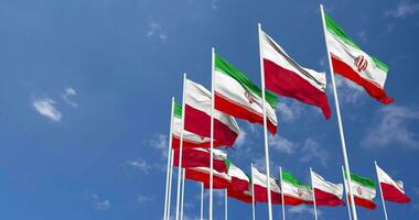 Poland and Iran Flags Waving Together in the Sky, Seamless Loop in Wind, Space on Left Side for Design or Information, 3D Rendering video