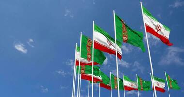 Turkmenistan and Iran Flags Waving Together in the Sky, Seamless Loop in Wind, Space on Left Side for Design or Information, 3D Rendering video