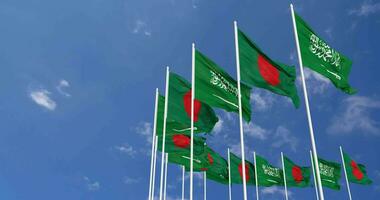 Bangladesh y ksa, Reino de saudi arabia banderas ondulación juntos en el cielo, sin costura lazo en viento, espacio en izquierda lado para diseño o información, 3d representación video