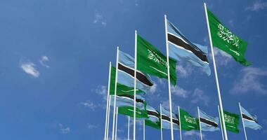 botsuana e ksa, reino do saudita arábia bandeiras acenando juntos dentro a céu, desatado ciclo dentro vento, espaço em esquerda lado para Projeto ou Informação, 3d Renderização video