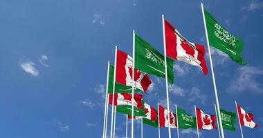 Canada and KSA, Kingdom of Saudi Arabia Flags Waving Together in the Sky, Seamless Loop in Wind, Space on Left Side for Design or Information, 3D Rendering video