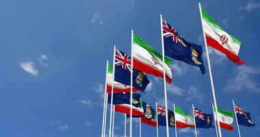 Cayman Islands and Iran Flags Waving Together in the Sky, Seamless Loop in Wind, Space on Left Side for Design or Information, 3D Rendering video