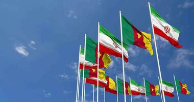 Cameroon and Iran Flags Waving Together in the Sky, Seamless Loop in Wind, Space on Left Side for Design or Information, 3D Rendering video