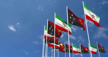 Papua New Guinea and Iran Flags Waving Together in the Sky, Seamless Loop in Wind, Space on Left Side for Design or Information, 3D Rendering video