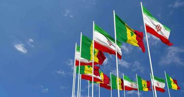 Senegal and Iran Flags Waving Together in the Sky, Seamless Loop in Wind, Space on Left Side for Design or Information, 3D Rendering video