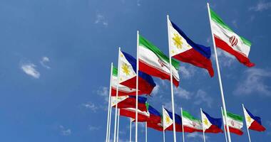 Philippines and Iran Flags Waving Together in the Sky, Seamless Loop in Wind, Space on Left Side for Design or Information, 3D Rendering video