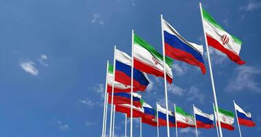 ryssland och iran flaggor vinka tillsammans i de himmel, sömlös slinga i vind, Plats på vänster sida för design eller information, 3d tolkning video