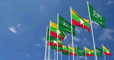 Myanmar, Burma and KSA, Kingdom of Saudi Arabia Flags Waving Together in the Sky, Seamless Loop in Wind, Space on Left Side for Design or Information, 3D Rendering video