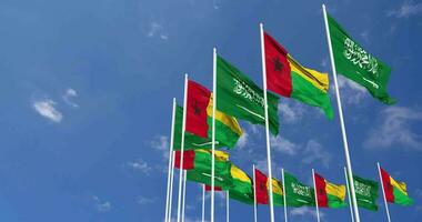 Guinea Bissau and KSA, Kingdom of Saudi Arabia Flags Waving Together in the Sky, Seamless Loop in Wind, Space on Left Side for Design or Information, 3D Rendering video