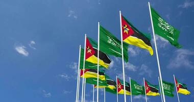 Mozambique and KSA, Kingdom of Saudi Arabia Flags Waving Together in the Sky, Seamless Loop in Wind, Space on Left Side for Design or Information, 3D Rendering video