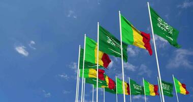 Mali and KSA, Kingdom of Saudi Arabia Flags Waving Together in the Sky, Seamless Loop in Wind, Space on Left Side for Design or Information, 3D Rendering video