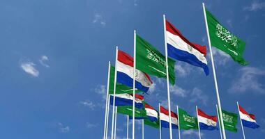 Paraguay and KSA, Kingdom of Saudi Arabia Flags Waving Together in the Sky, Seamless Loop in Wind, Space on Left Side for Design or Information, 3D Rendering video