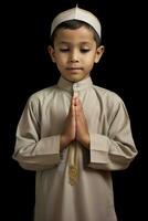 AI generated Young boy in traditional Muslim attire praying photo