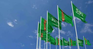 turkmenistan och ksa, rike av saudi arabien flaggor vinka tillsammans i de himmel, sömlös slinga i vind, Plats på vänster sida för design eller information, 3d tolkning video