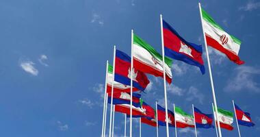 Cambodia and Iran Flags Waving Together in the Sky, Seamless Loop in Wind, Space on Left Side for Design or Information, 3D Rendering video