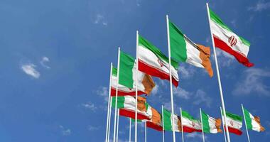 Ireland and Iran Flags Waving Together in the Sky, Seamless Loop in Wind, Space on Left Side for Design or Information, 3D Rendering video