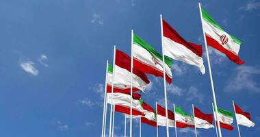 Monaco and Iran Flags Waving Together in the Sky, Seamless Loop in Wind, Space on Left Side for Design or Information, 3D Rendering video