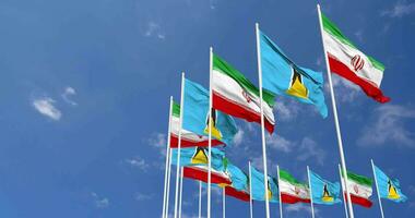 Saint Lucia and Iran Flags Waving Together in the Sky, Seamless Loop in Wind, Space on Left Side for Design or Information, 3D Rendering video