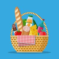 WIcker picnic basket with gingham blanket full of products. Bottle of wine, sausage, bacon, cheese, apple, tomato, cucumber, salad, orange juice. Vector illustration in flat style