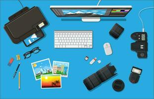 Workspace of photographer. Desktop pc, printer. Modern photo camera, flash, lens and memory card. Professional device for photography. Digital photos and printing. Vector illustration in flat style