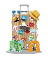 Plastic travel bag. Plastic case with wheels. Hat, photo camera, eyeglasses, paper map, compass, flip flops. Labels places all over the world. Baggage and luggage. Vector illustration in flat style