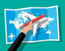 Airplane top view. Passenger or commercial jet in hand. Paper world map. Aircrfat in flat style. Journey or vacation concept, business trip. Vector illustration