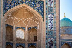 Tashkent, Uzbekistan-august 11, 2023-view of the entrance of the Tillya Sheikh Mosque  during a sunny day.The complex is a square that includes a set of religious buildings in Tashkent photo