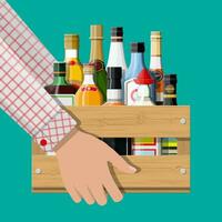 alcohol bebidas colección en caja en mano. botellas con vodka champán vino whisky cerveza brandy tequila coñac espíritu Vermut Ginebra Ron Ajenjo Sambuca sidra Borbón. vector ilustración en plano estilo