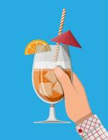 Glass of cold drink, alcohol cocktail in hand. Orange slice and umbrella. Lemonade or fruit juice with ice cubes. Refreshment beach drink with straw. Vector illustration in flat style