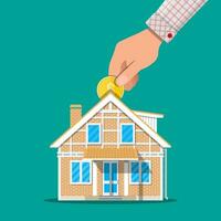 Hand put coin in piggy bank house. Vector illustration in flat style