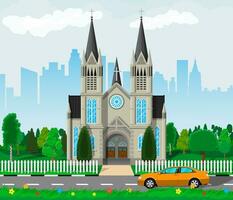 Exterior of catholic or protestant church cathedral in gothic style with city skylines, road, car and trees behind. Urban chapel. Tower with cross. Vector illustration in flat style