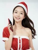 AI generated Santa cute girl holding a mobile phone and a gift on a white background AI generated photo