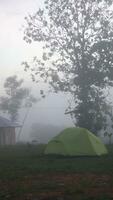 Climber's tent at the top of the mountain. The atmosphere of the camping ground at the top of Mount Arang photo